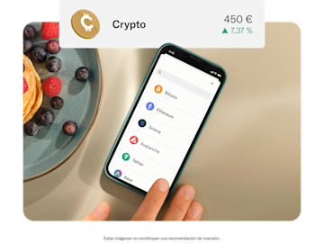 Una imagen de un móvil mostrando criptomonedas junto a un postre, con una ventana emergente que muestra las ganancias en cripto.