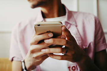 A person looking at their phone. 