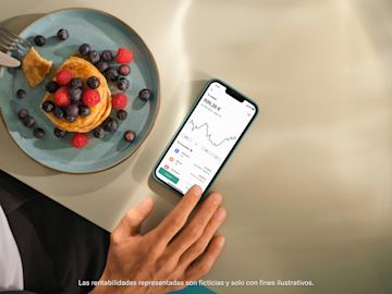 Aplicación de N26 mostrando crypto y su fluctuación junto a un postre.