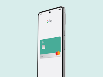 A smartphone displays the Google Pay screen with a green N26 Mastercard digital card visible.