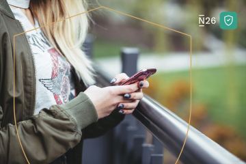 A woman looking at her cellphone.