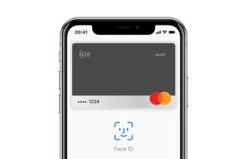 El iPhone X con la pantalla de Apple Pay abierta en él.