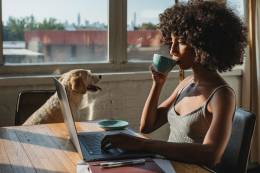 Woman drinking coffee.