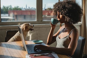 Woman drinking coffee.