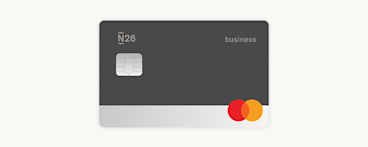 A dark grey and silver N26 debit card featuring a silver chip and the Mastercard logo.