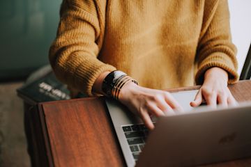 Someone is typing on a computer.