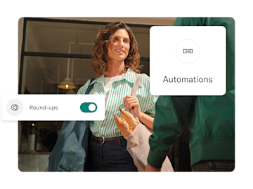 A woman holds groceries, with overlaid cards showing the "Round-ups" feature toggled on and an "Automations" icon.
