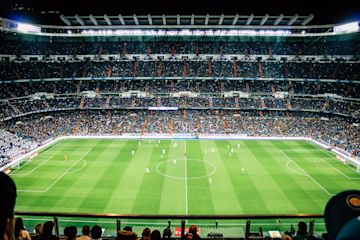 A football stadium with spectators.