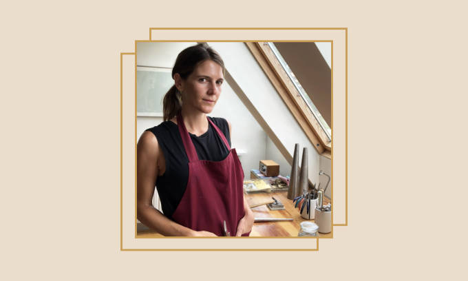 Jewelry designer in her workshop.