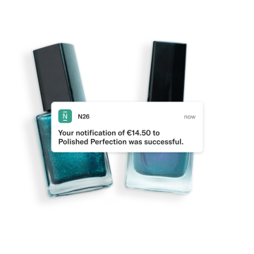 Image of two nail polish removers and an N26 notification.