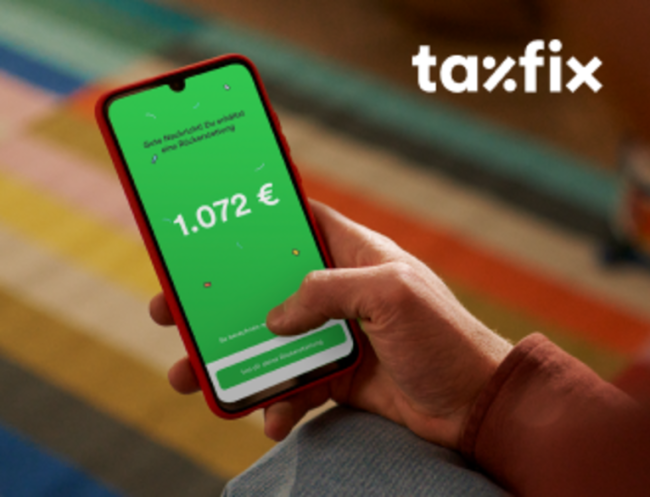 A person uses the Taxfix app on their smartphone.