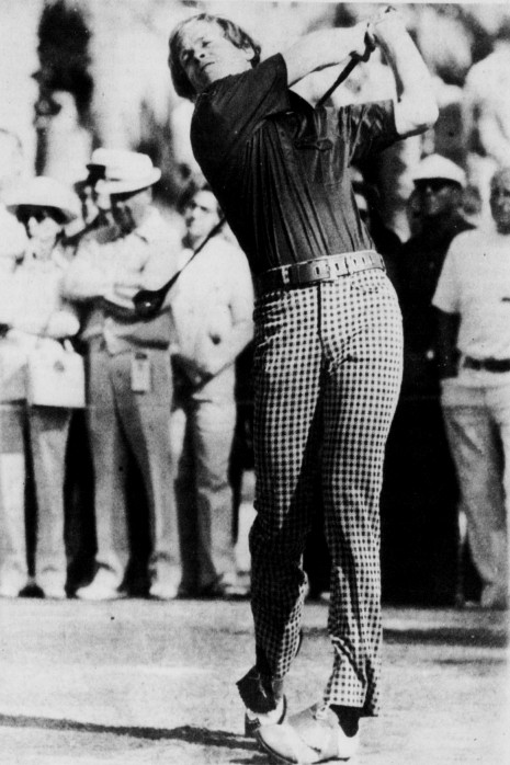 Johnny Miller follows through on a tee shot in 1975. Photo by Chuck Scardina, The Desert Sun, Feb. 6, 1975. Public domain in the US (published 1931-1977 without a copyright notice). Source: Wikimedia Commons, File:Johnny_Miller_1975.jpeg.