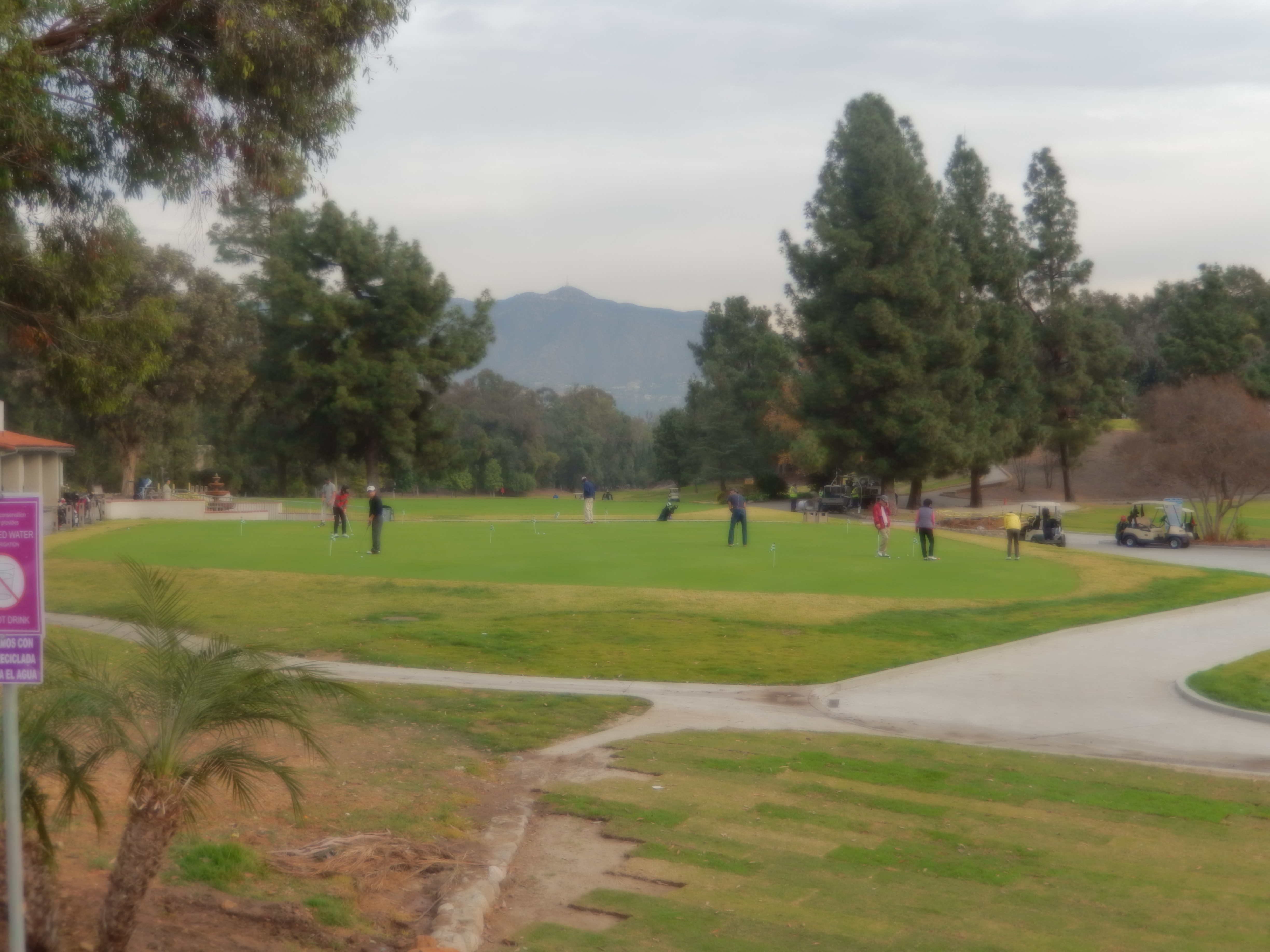 Golfers at Griffith Park Golf Course, Los Angeles. Photo by Billy Hathorn via Wikimedia Commons, licensed CC BY-SA 3.0. Used for editorial coverage on a non-commercial site.