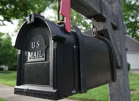 Black mailbox with U.S. mail written on front.