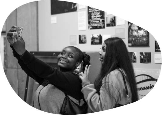 Two young women of colour taking a selfie