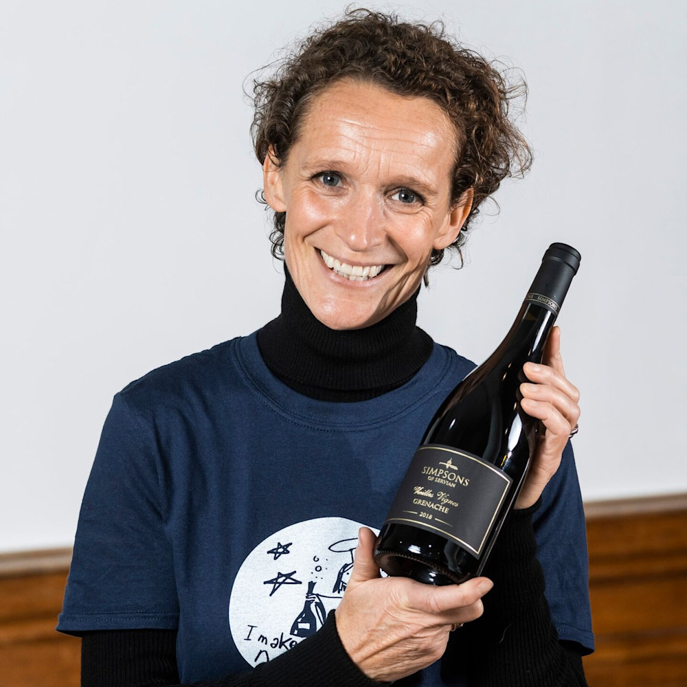 Ruth Simpson proudly showing off the final product after bottling - Simpsons of Servian Vieilles Vignes Grenache