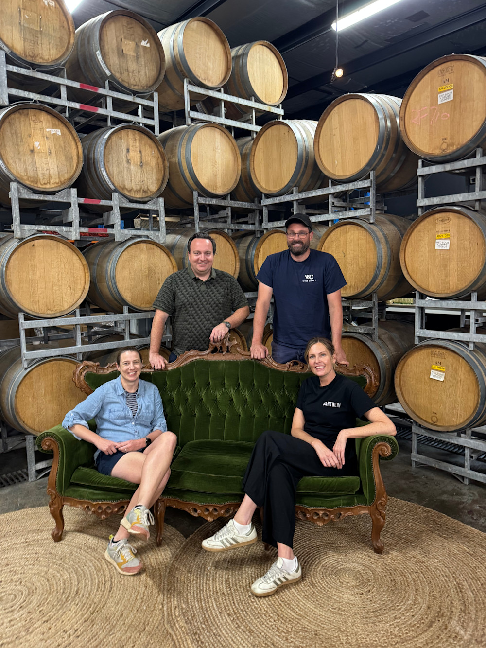 Only the Santolins would put a genuinely stylish vintage sofa in a working winery (and completely rock it too)