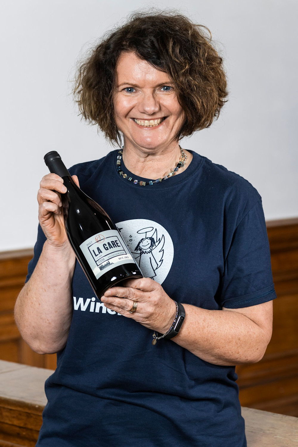 Katie Jones proudly showing off the final product after bottling - Katie Jones La Gare Fitou

