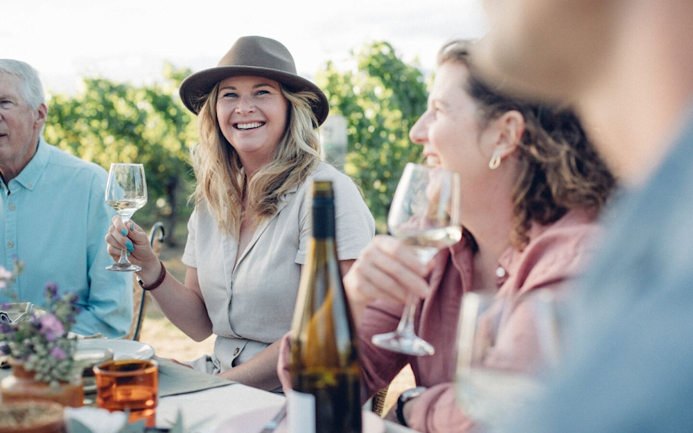 A group of winemakers enjoying the fruits of their labour.