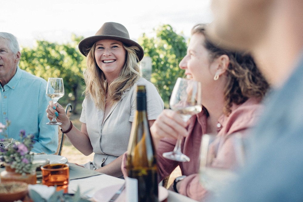 A group of winemakers enjoying the fruits of their labour.