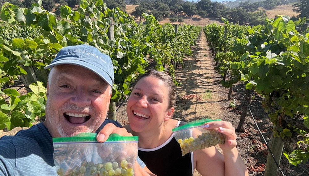 Daryl and his daughter, fellow winemaker Kara, with their freshly picked grape samples
