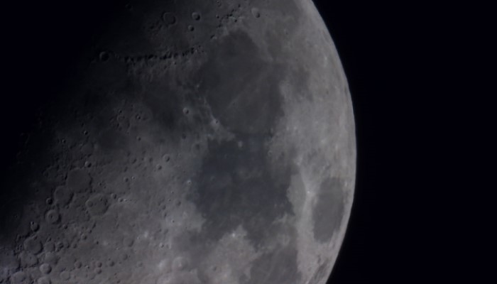 Photo of the moon taken from a telescope.