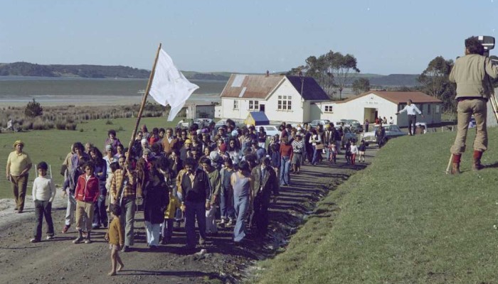 Image: Participants in Māori Land March leaving Te Reo Mihi Marae, Te Hapua (https://natlib.govt.nz/records/36389788) by Christian Heinegg. Collection: Alexander Turnbull Library. Ref: 35mm-87491-16-F.