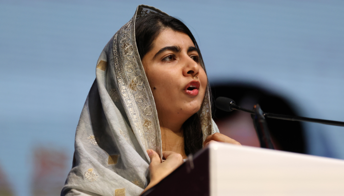 Close up photo of Malala Yousafzai speaking at the 2023 Nelson Mandela Annual Lecture.