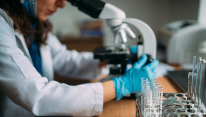 Image: Doctor looking in the microscope (https://commons.wikimedia.org/wiki/File:Doctor_looking_in_the_microscope.jpg) by  Nenad Stojkovic on Wikimedia Commons. CC BY 2.0 (https://creativecommons.org/licenses/by/2.0/deed.en), Image cropped.
