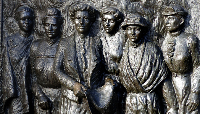 Colour photograph of a bronze memorial sculpture depicting Kate Sheppard and other suffragists.