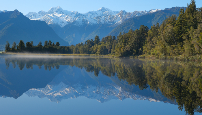 Image: Lake Matheson reflection of Mount Tasman and Aoraki Mount Cook (https://commons.wikimedia.org/wiki/File:Lake_Matheson_reflection_of_Mount_Tasman_and_Aoraki_Mount_Cook.jpg) by Pseudopanax on Wikimedia Commons. Public Domain. Image cropped.

