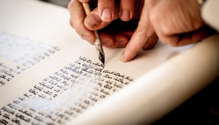 Image: Torah scroll writing (https://www.flickr.com/photos/keshet/15459396094/) by Liran1977 on Wikimedia Commons. CC BY-SA 3.0 (https://creativecommons.org/licenses/by-sa/3.0/deed.en). Imaged cropped.
