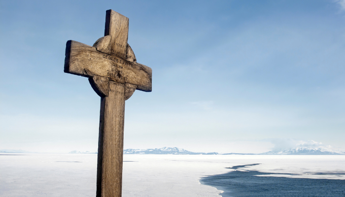 Colour photo of the wooden cross erected at Hut Point, Ross Island, Antarctica.