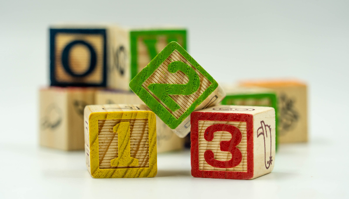 Image: Children's number blocks being used for learning to count - 51069936953 (https://commons.wikimedia.org/wiki/File:Children%27s_number_blocks_being_used_for_learning_to_count_-_51069936953.jpg) by perpetual.fostering on Wikimedia Commons.