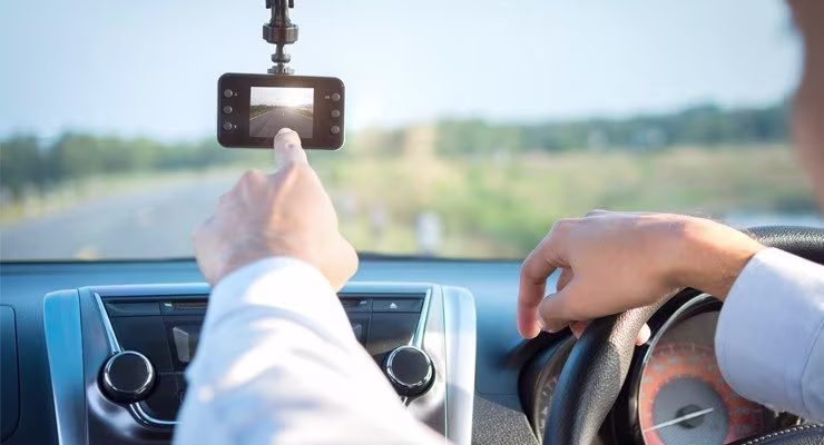 man driving with dash cam