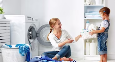 Woman on laptop with MoneySuperMarket logo displayed