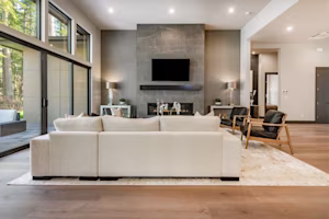 Woman on laptop with MoneySuperMarket logo displayed