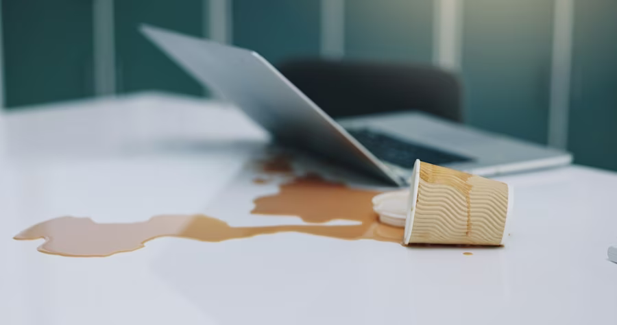 damaged laptop from spilt coffee