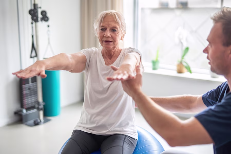 woman having physiotherapy on arm and shoulder