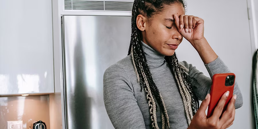 Frustrated woman with phone