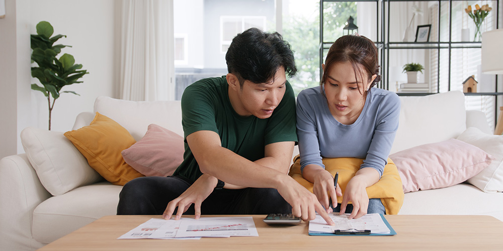 couple calculating budget