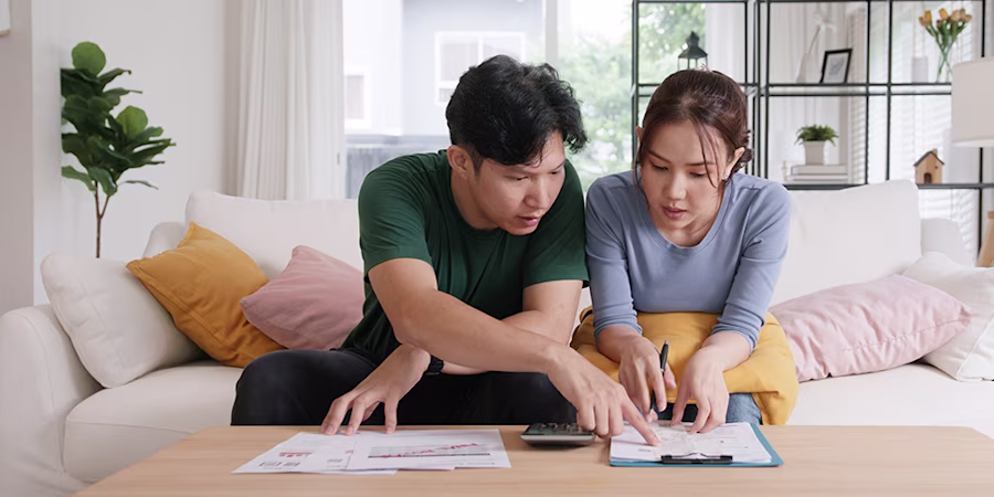 couple calculating budget