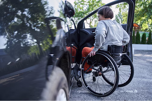 Disabled driver getting in to car_shutterstock_2025752027