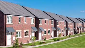 Woman on laptop with MoneySuperMarket logo displayed
