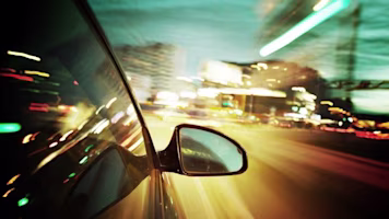 Woman on laptop with MoneySuperMarket logo displayed