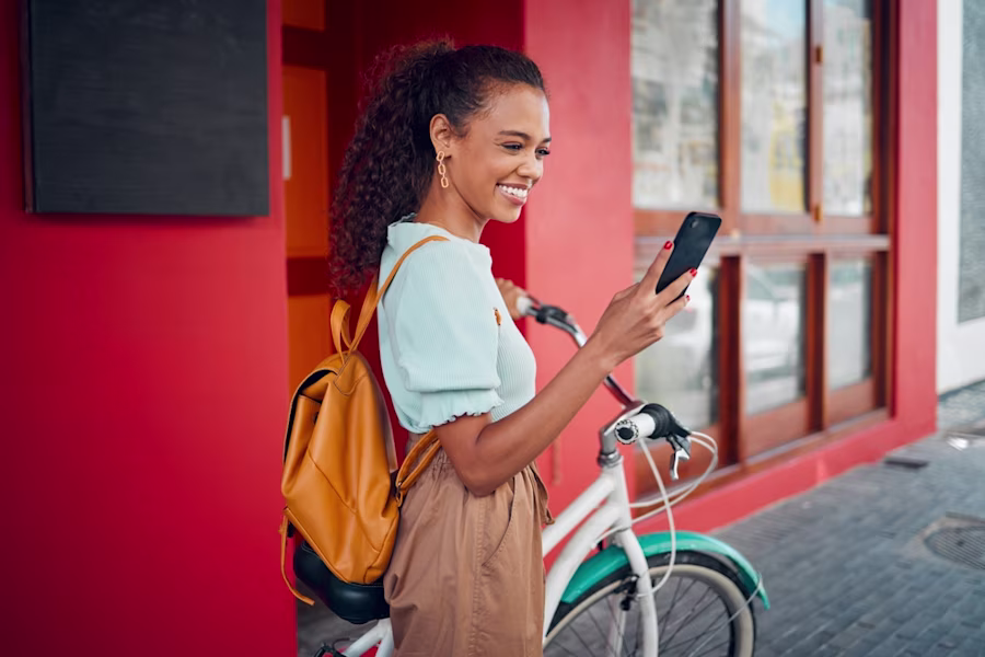 Mobile, cycling and transport with a young female traveling abroad or overseas alone