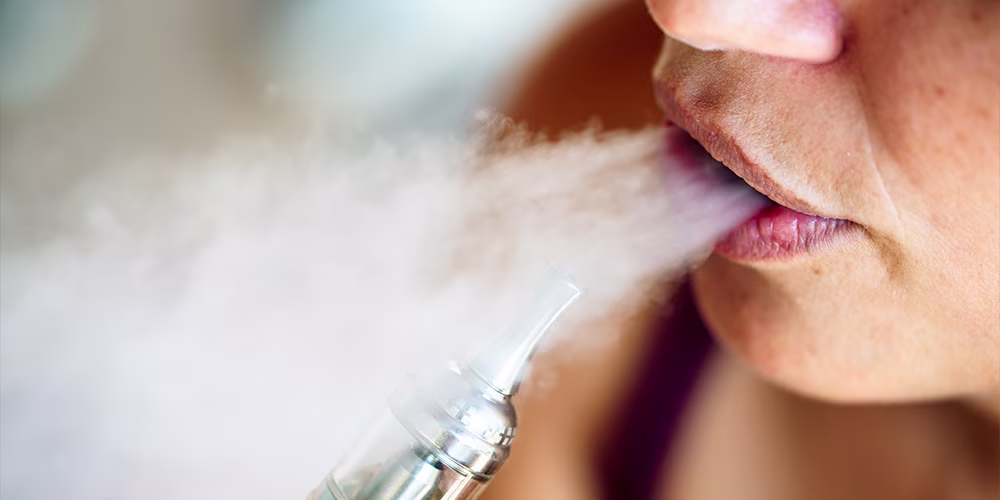 woman using vape