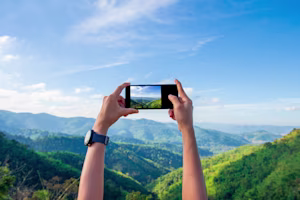 Woman on laptop with MoneySuperMarket logo displayed