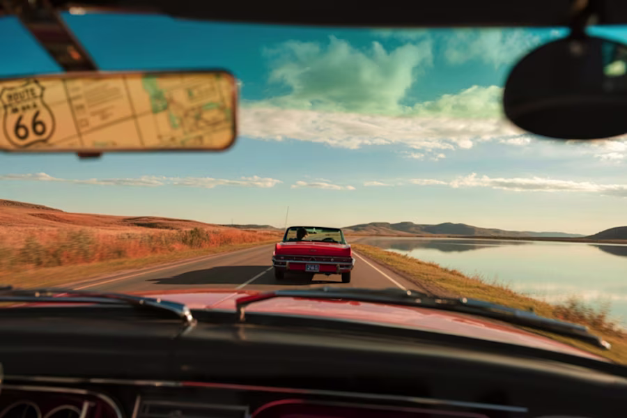 classic car on road, view from windscreen