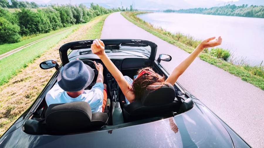 Man and woman in car abroad